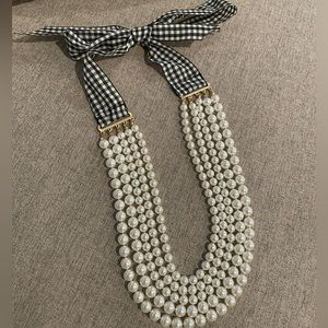 Pearl necklace with gingham ribbon tie